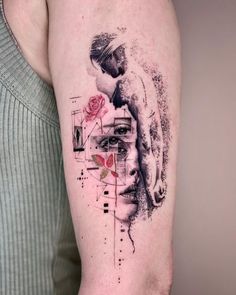 a woman's arm with a tattoo on it and a rose in the center