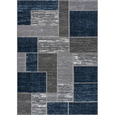 a blue and gray rug with squares on the bottom, in different shades of grey