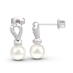 Simple but not plain, this pair of earrings makes a little lovely gift for loved one or yourself. Crafted in sterling silver, inspired from contemporary style, this pair of earrings shows an elegant look with its knot design. Two 7mm pearls and shimmering round stones are set on the knot to add extra sparkle to it. Treat yourself or surprise her with this piece.Carat Weight: 5.342 ctStone Size: 1.5,7 mmStone Type: Jeulia® StoneNumber of Stones: 14 Stone Color: Diamond WhiteStone Shape: RoundWeig Elegant Sterling Silver Pearl Earrings For Evening, Elegant Sterling Silver Diamond Earrings, Elegant White Diamond Earrings In Sterling Silver, Elegant Pierced White Gold Bridal Earrings, Classic Sterling Silver Pearl Earrings For Evening, Classic Sterling Silver Earrings For Evening, Formal Sterling Silver Diamond Earrings With Pearl Drop, Elegant Pierced White Gold Pearl Earrings, Elegant Sterling Silver Diamond Earrings For Formal Occasions