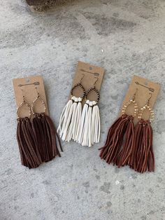 Elegant Brown Adjustable Tassel Earrings, Elegant Brown Dangle Tassel Earrings, Brown Fringed Tassel Earrings Gift, Brown Fringe Tassel Earrings For Gift, Brown Fringe Tassel Earrings As Gift, Brown Fringe Dangle Jewelry, Brown Dangle Earrings With Tassels, Elegant Leather Fringe Jewelry, Adjustable Brown Earrings With Beaded Fringe