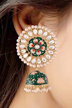 I Jewels 18k Gold Plated Traditional Handcrafted Kundan Pearl Studded Meenakari Jhumki Earring for Women (E2917G) Stylish meenakari worked traditional 18k gold plated round stud earrings with lovely combination of colors from I Jewels. These earrings, made with Love by our karigar with real carftmanship, will complement any occasion ethnic wear. These beautiful earrings are handcrafted in alloy with pearls of good quality. Coated with high quality and thickness gold. Product Features: Color: Gre Jhumki Earrings, Earring For Women, Jhumka Earrings, Round Stud Earrings, Buy Buy, Pearl Studs, Ethnic Wear, Things To Buy, Beautiful Earrings