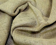 a close up view of a fabric made out of burlocked linens