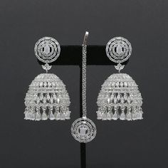 Big Jhumka Jhumki earring maang tikka set studded with american diamond crystals and embellished with precious color stones