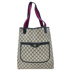 As stylish as it is spacious, this Gucci Vintage GG Monogram Sherry Tote is the perfect accessory for your everyday needs. Featuring the iconic GG Monogram coated canvas with leather trimming and gold-tone interlocking G logo, it offers a chic and versatile look. With a roomy navy interior and sturdy web fabric shoulder straps, this tote is in very good condition and is sure to elevate your style. Made in Italy, it's a true testament to Gucci's quality and craftsmanship. Designer: Gucci Material: GG Plus, Web Accent, Leather Trim Date/Authenticity Code: 904-02-003 Measurements: 12"W x 14"H x 5"D Strap Drop: 9.5" Interior Lining: Canvas Opening/Closure: Open Hardware: Gold-tone Includes: Entrupy COA Overall Condition: Very good pre-owned vintage condition with some minor residue to the inte Navy Interior, Tote Outfit, Gucci Vintage, Gg Monogram, G Logo, Bags Logo, E Logo, Vintage Coat, Look Chic