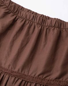 Details: Maxi skirt with layered designSkirt Length: LongMaterials:95% Polyester + 5% Spandex Casual Skirt Bottoms For Layering, Spring Brown Tiered Skirt, Brown Tiered Skirt For Spring, Tiered Lined Skirt For Layering, Layering Tiered Lined Skirt, Brown Lined Tiered Skirt, Brown Tiered Lined Skirt, Relaxed Ruffled Mini Skirt, Solid Color Tiered Skirt Dress With Lined Skirt