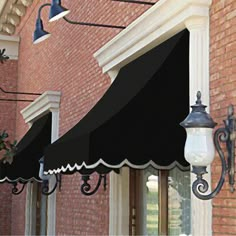 an awning on the side of a brick building