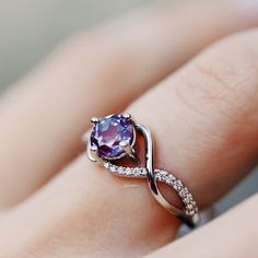 Infinity Gemstone Rings For Anniversary, Elegant Amethyst Open Ring For Wedding, Elegant Open Amethyst Ring For Wedding, Elegant Amethyst Promise Ring With Accent Stones, Amethyst Ring With Brilliant Cut For Anniversary, Amethyst Diamond Ring With Center Stone For Anniversary, Elegant Amethyst Promise Ring With Round Band, Elegant Infinity Jewelry With Accent Stones, Elegant Amethyst Ring With Round Band For Promise