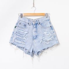 "Vintage 90's cut-off denim shorts in light-blue - brand: Zeus - distressed and frayed - super high waist - 5 pockets - zip fly - material: 100% cotton denim SIZE size from label: 12 best fits women: S/M MEASUREMENTS waist: 27 inches (69 cm) hips: 38,5 inches (98 cm) rise: 13 inches (33 cm) The model is 5'9\" (174 cm), measures 35-27-38 (89-69-96 cm) and typically wears clothing in size M CONDITION - 7/10 - the short in good pre-owned vintage condition. Washed. Ready to wear." 90s Shorts, Fits Women, Distressed Denim Shorts, Short En Jean, Style Expert, Vintage Skirt, Jeans Shorts, Distressed Denim, Short Outfits