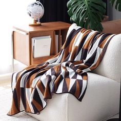 Elevate your home decor with this Modern Geometric Throw Blanket. Featuring a sophisticated color palette of mauve, black, and cream in a striking angular pattern, this throw is both bold and elegant. Crafted with care, it adds a layer of style and comfort to any space, perfect for contemporary and minimalist interiors.• Geometric Design: Eye-catching pattern with sharp, angular lines.• Soft & Cozy: Made from quality fabric for warmth and comfort.• Stylish Accent: Complements modern and minimali Area Rugs Dining Room, Modern Throw Blanket, Dining Room Area Rug, Sophisticated Color Palette, Office Area Rugs, Bedspreads Comforters, Rug Runner Kitchen, Bedroom Area Rug, Rug Dining Room