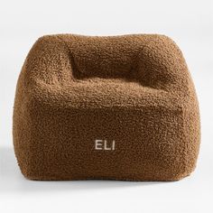 a brown bean bag chair with the word ej on it's front side