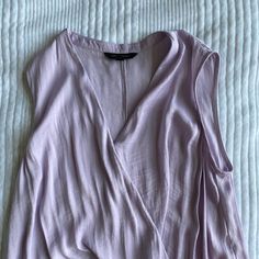 The Pictures Don’t Do The Color Justice! It’s An Amethyst Lavender. Truly Gorgeous And Lovely Flowy Silky Material Never Worn But No Tags. Size Small! Purple V-neck Blouse For Day Out, Lavender V-neck Summer Blouse, Chic Mauve V-neck Top, Chic Purple V-neck Top, Chic Pink Viscose Top, Feminine Purple Workwear Top, Feminine Purple Top For Workwear, Feminine Purple Tops For Workwear, Elegant Lavender Tops For Spring