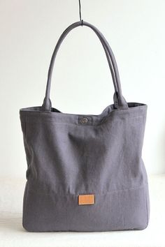 Overview: (1)ECO-Friendly Canvas Fit &Sizing: Non-Stretchable #shoulderbag #canvas #handbag #preppystyle Trendy Everyday Cotton Satchel, Trendy Cotton Satchel For Everyday Use, Casual Gray Shoulder Bag For Everyday, Trendy Gray Shoulder Bag For Everyday, Chic Cotton Bags With Pockets, Trendy Hobo Bag With Hasp Closure For Everyday, Casual Gray Hobo Bag For Everyday, Everyday Large Capacity Gray Canvas Bag, Trendy Everyday Bags With Snap Closure