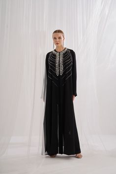 This season, make a bold fashion statement with this handmade Abaya, designed with precision beadwork. The intricate craftsmanship and individually placed beads create a unique and stylish finish, perfect for any occasion. Fabric: Polyester Handmade Beat WorkThis item runs True To Size One Piece Shipping: Please be advised that sometimes delivery times may take a bit longer as this product is being shipped from our warehouse abroad. We appreciate your patience and understanding. Thank you for ch Ribbed Jacket, Clearance Sale, Daily Wear, Modest Fashion, Fashion Statement, Wellness Design, Bead Work, One Piece, Take That