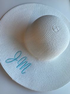 "Talk about a statement. These floppy hats are perfect for beach, pool or picnic. Keep yourself protected from the sun in style! Many different colors to choose from to personalize your look. 7 colors to choose from- embroidered with your choice of font and thread color. Details: Paper Blend Approximately 22\" Around the Head Brim Width: 5\" Please leave the following in personalization section at checkout: 1. Initials in the exact order they will be embroidered from L to R Female monogram= firs Adjustable White Sun Hat For Vacation, Adjustable White Panama Hat For Beach Season, White Straw Cap For Vacation, White Cap Straw Hat For Vacation, Adjustable White Sun Hat For Beach Season, White Beach Hat For Vacation, White Wide Brim Bucket Hat For Beach, Adjustable White Straw Hat For Beach Season, White Straw Hat For Vacation