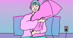 a person sitting on a couch with a pink blanket