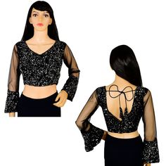 Item Description Beautiful Women's Velvet Sequins V-Neck Net Sleeves Ethnic Designer Blouse Fabric:-Velvet Sequins Color:-Black Sale For:-1 Blouse Closure Type:-Back Hook & Eye With Dori Sleeves Type:-3/4 Sleeves Neck Style:-V-Neck Product:-Padded Blouse With Cotton Inner Lining Care Instructions:-Hand Wash or Dry Clean Only Disclaimer:-The Actual Color Of The Product Slightly Vary From The Image Due To Photographic Light Or Monitor's Display. Measurement Sleeves Length:-21.5 Inch Front Neck Depth :-8 Inch Back Neck Depth :-11.5 Inch Ethnic Sequins Work Velvet Designer Blouse Net Sleeves To Give Yourself A Splendid Traditional Makeover! A Perfect Match For Your Grand Sarees.Pair This Ready To Wear Blouse With Any Type Of Saree In Various Occasions.This Would Be Classy Yet Fashionable Choic Traditional V-neck Party Sets, Party V-neck Traditional Wear With Zari Work, Fitted V-neck Blouse With Mirror Work, Festive V-neck Georgette Blouse Piece, Fitted V-neck Top With Mirror Work, Festive Georgette V-neck Blouse Piece, V-neck Traditional Wear For Navratri Party, Diwali V-neck Blouse With Mirror Work, V-neck Party Lehenga With Zari Work