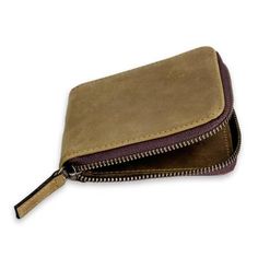 A zipper closure safeguards this wallet by Ricardo Hinojosa. Fully lined it opens to reveal a pocket for bills and six credit card compartments three on each side. It is handcrafted of amber leather. Brown Rectangular Wallet With Zipper Closure, Classic Brown Wallet With Zipper Pocket, Brown Leather Card Holder With Zipper, Leather Coin Purse With Zipper Pocket, Rectangular, Brown Leather Card Holder With Zipper Closure, Brown Leather Coin Purse With Zipper Closure, Leather Rectangular Coin Purse With Zipper Pocket, Rectangular Leather Coin Purse With Zipper Pocket, Brown Trifold Wallet With Zipper For Daily Use