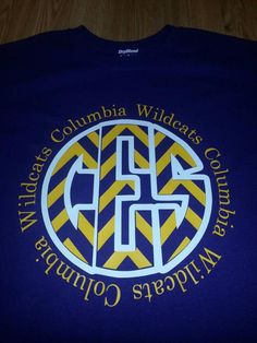 a blue and yellow shirt with the words columbia wildcats country club on it's chest