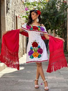 This Beautiful Mexican Floral Dress is the perfect dress for a special event or Mexican Fiesta. It reflects the Mexican culture through its unique design and vibrant colors.  It has elastic on the back for an adjustable fit and is embroidered by Artisanal Machine by Mexican Artisans in Guanajuato, Mexico. It's made out of fresh Mexican cotton, is full of embroidered multicolor flowers. Size S - XL Shop more Mexican Dresses here:  https://www.etsy.com/es/shop/SoleiEthnic?ref=seller-platform-mcnav Mexican Outfits For Women, Botton Down Dress, Easter Dress Toddler, Mexican Style Dresses, Traditional Mexican Dress, Easter Dresses For Toddlers, Garden Party Dresses For Women, Dresses By Style, 90s Fashion Outfits Hip Hop Party