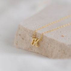 Presenting our Personalized Initial Necklace, a custom accessory that adds a touch of charm to any ensemble ♡ Crafted with love and attention to detail, this necklace features a dainty pendant adorned with your chosen initial, making it a perfect gift to celebrate individuality and style! Material: High Quality Solid 925 Sterling Silver Finish: Sterling Silver ∙ 18K Gold ∙ Rose Gold Dimension: ~7mm letter height Model showcases a minimalist, everyday layering look featuring our Modern Initial Bi Simple Charm Necklace With Initial Pendant, Simple Initial Pendant Necklace With Clavicle Chain, Simple Initial Necklace With Clavicle Chain, Dainty Charm Necklaces With Initial Pendant, Delicate Initial Pendant Necklace For Her, Delicate Initial Pendant Necklace As Gift For Her, Delicate Initial Necklace Gift, Dainty Monogram Necklace For Personalized Gift, Dainty Necklaces With Initials As Personalized Gifts