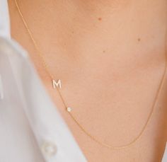 Beautifully handcrafted 14k solid gold asymmetrical initial and a small bezel diamond on a dainty cable link chain necklace, available in 14k yellow gold, white gold, and rose gold. This stunning piece will be you new favorite necklace. Wear it with your initial, or your loved one's.Made in L.A.Please note placement initial chart when selecting initialsInitial Size: Approx. 6mmBezel diamond: 0.03 ct. twClarity: VSWeight : Approx. 2 gramsShips in 4-8 business daysComes gift ready in a beautiful c Fine Jewelry Initial Necklace With Cable Chain, Fine Jewelry Initial Pendant With Single Diamond, Elegant Diamond Initial Necklace With Cable Chain, Fine Jewelry Initial Necklace With Delicate Chain, Minimalist Diamond Initial Necklace, Gold Letter Necklace, Name Necklaces, Gold Letter, Initial Pendant Necklace