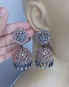 Stunning AAA cubic zirconia Victorian black/rose gold/silver mint /silver champagne/silver multi  Real looking.                                                                              Pack Contents: 2 Earrings. Very Lightweight,  Each Jhumka Weight: 0.08 Oz only. Design: AD / Stone / Zirconia / Brass Gemstone: White  (Clear) Base Metal Color: Victorian/rose gold/silver  back Type: Pushback/Earlobe Cubic Zirconia Jhumkas For Celebration, Party Chandbali Jhumkas Hand Set, Hand Set Chandbali Jhumkas For Party, Fusion Style Chandbali Jhumkas For Party, Traditional Hand-set Jhumkas For Parties, Bollywood Style Cubic Zirconia Jhumkas, Fusion Kundan Jhumkas For Party, Fusion Style Kundan Jhumkas For Party, Festive Hand Set Jhumkas For Party