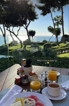 breakfast on an outdoor patio overlooking the ocean