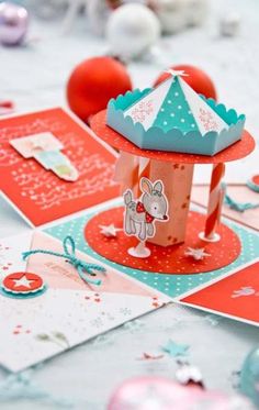 a table topped with lots of cards and decorations