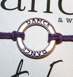 12 DANCE WISH Bracelets You can pick the qty. you need from the drop down at checkout. Great for Gifts, Team Spirit, Coach Gifts, Birthday Favors Can also be used as Friendship Bracelets A round infinity affirmation charm reads DANCE in the round and is knotted and tied at center Bracelet ties on and is adjustable - Just knot and cut cord to desired length Assorted hemp cord colors - Please the color that fits! Refer to the last picture Bracelet is tied to a card that reads: DANCE A Wish Bracele Good Luck Dancer Gift Ideas, Dance Buddy Gifts, Dance Team Motivation Gifts, Dance Squad Gifts, Dance Team Gifts Bracelets, Silver Adjustable Jewelry For Dance, Picture Bracelet, Hemp Cord, Wish Bracelets