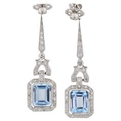 8.25 Carat Blue Topaz Drop Earrings 18k White Gold 66 Diamonds - 0.94 Carat 6gr per Earring Luxury Blue Topaz Dangle Earrings, Luxury Platinum Blue Earrings, Elegant Blue Gia Certified Diamond Earrings, Luxury Blue Platinum Earrings, Classic Blue Platinum Earrings, Elegant Blue Platinum Earrings, Blue Gia Certified Diamond Earrings For Wedding, Blue Diamond Drop Earrings For Formal Occasions, Elegant Light Blue Gemstone Earrings