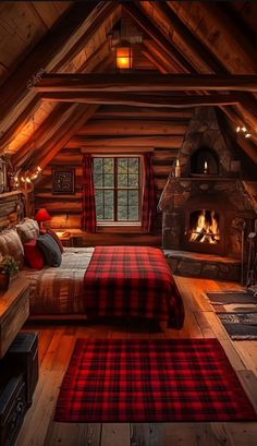 a bed room with a neatly made bed and a fire place