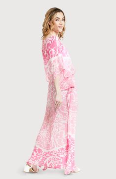 Hit the beach or kick it poolside in this flowy kaftan that features an allover abstract pattern, kimono-inspired sleeves and a tie waist. Scoop neck Kimono-inspired sleeves 100% viscose Hand wash, line dry Imported Printed Flowy Kaftan For Beach Cover-up, Chic Pink Kaftan For Vacation, Spring Bohemian Kaftan With Abstract Print, Spring Flowy Kaftan Beachwear, Chic Pink Kaftan For Beach Cover-up, Patterned Kaftan For Spring, Summer Patterned Maxi-length Kaftan, Spring Beach Cover-up Kaftan With Tie Waist, Chic Printed Kaftan For Spring