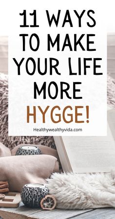 an open book on top of a bed with the words 11 ways to make your life more hygge