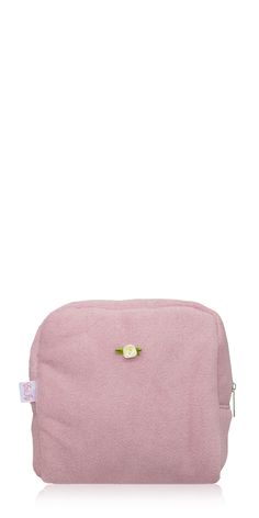 The Terry Pouch Baby Mauve by Emi Jay is your go-to accessory for hair care on the go. Made from a microfiber terry blend, this pouch is adorned with a delicate rosette and features a satin-lined interior. Keep all your hair essentials organized and easily accessible in one place. Details: Color: Baby Mauve Microfiber Poly Terry Satin lining Zip closure Measurements: 6 1/2" x 4 1/2" x 7"