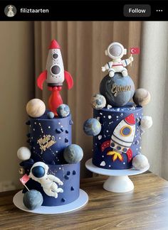 two cakes decorated with space themed decorations