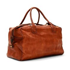 Handcrafted in soft leather and hand polished for a vintage patina, the John Woodbridge Weekend Bag will be your faithful companion for a quick getaway or your trips to the gym. This cabin-sized model is ready to hop on a plane whenever you are. For all you boxers out there: It has room enough to fit your gloves.- Dimensions : 50 x 25 x 25 cm- One pocket with zip closure- One pocket for your phone/passport- Interior lining in cotton- Removable, adjustable leather strap Cognac Smooth Grain Leather Duffle Bag For Travel, Cognac Smooth Grain Weekender Bag For Travel, Vintage Brown Leather Bag With Luggage Sleeve, Brown Bags With Waxed Finish For Weekend Trips, Vintage Oiled Leather Travel Bag, Classic Brown Luggage For Overnight Trips, Cognac Duffle Bag With Luggage Sleeve For Overnight Trips, Classic Brown Weekender Bag For Weekend Trips, Brown Leather Luggage For Overnight Trips