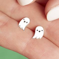 Our spooky 'White Halloween Ghost' earrings are the perfect accessory for Halloween. Our carefully designed 'White Halloween Ghost' earrings are the perfect accessory for any Halloween costume! Our fun and quirky 'White Halloween Ghost' earrings would make the best gift for any Halloween enthusiast. These earrings have been created with comfort in mind, they can be worn all day long. Is it a gift? We've got the perfect finishing touches, our gift cards feature hand illustrated prints to celebrat Cute White Halloween Earrings, Spooky White Earrings For Halloween, Spooky White Halloween Jewelry, Fun White Halloween Earrings, Cute Hypoallergenic Halloween Earrings, Spooky White Earrings For Party, White Spooky Earrings For Party, Hypoallergenic White Jewelry For Halloween, Halloween Themed White Earrings