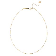 Indulge in the exquisite craftsmanship of our Handmade 18K Tube Beading Ceramic Chain. This one-of-a-kind necklace is made with 18K gold and features a unique ceramic chain. With a length of 16-18" and our signature silicon slide extender, this piece will elevate any outfit. Luxury White Chain Necklace With Adjustable Chain, Luxury Gold Beaded Necklace With Pearl Chain, White Luxury Necklace With Delicate Chain, Luxury White Necklace With Delicate Chain, Luxury Necklace With Pearl Chain And Round Beads, Luxury Pearl Chain Necklace With Round Beads, Yellow Gold Beaded Necklaces With Delicate Chain, Yellow Gold Beaded Necklace With Delicate Chain, Elegant Gold Plated Jewelry With Tiny Beads