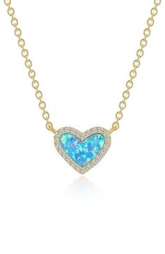 Bring a little sparkle and lustrous romance to any ensemble with this simulated opal heart pendant necklace traced in pavé simulated diamonds. 20" length; 3/8" pendant drop Sterling silver/18k-gold plate/simulated opal/simulated diamond Imported >Diamond Guide Elegant Blue Heart Necklace, Elegant Blue Necklace With Heart Charm, Elegant Blue Necklaces With Heart Charm, Elegant Blue Necklaces For Valentine's Day, Blue Heart Cut Necklace For Formal Occasions, Elegant Blue Heart Necklace For Valentine's Day, Fine Jewelry Blue Heart Necklace, Blue Heart Pendant Necklace For Formal Occasions, Blue Heart-shaped Fine Jewelry Necklace