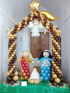 balloon arch with nativity scene and decorations