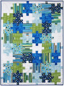 a blue and green patchwork quilt