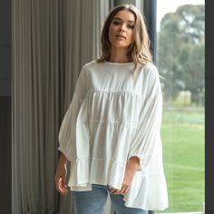 Maya Blouse - White, Equivalent To A Us6 But It Runs Oversized. Main |65% Cotton 35% Linen Oversized, Smock Styled Top With Trapeze Flare Tiered Style Elasticated Cuff Extended Key Hole Back With Button Closure The Neckline And Armhole Fits True To Size, All Other Points Of Fitting Are Oversized. We Would Suggest Going Down At Least One Size. Nwt, Open To Reasonable Offers! Billowy Cotton Top For Day Out, White Long Sleeve Effortless Top, Oversized Chic Blouse For Brunch, Effortless White Long Sleeve Top, Flowy Balloon Sleeve Top For Brunch, Oversized White Blouse For Layering, Chic Oversized Tops For Brunch, Oversized Cotton Blouse With Balloon Sleeves, Billowy Spring Blouse