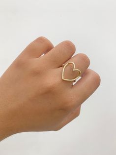 -14k Heart Ring  -100% Gold  -Size 7  -Yellow gold  -Item sold by piece.Weight undetermined. Gold 14k Heart Ring In Fine Jewelry Style, 14k Gold Heart Ring In Fine Jewelry Style, Gold Double Heart Ring For Valentine's Day, Valentine's Day Gold Double Heart Ring, Gold Open Ring Heart Ring For Promise, Gold Heart Ring With Heart Charm, Gold Open Heart Ring For Promise, Gold Double Heart Promise Ring, Yellow Gold Heart Ring With Charm