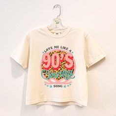 a white t - shirt that says love me like a 90's birthday song