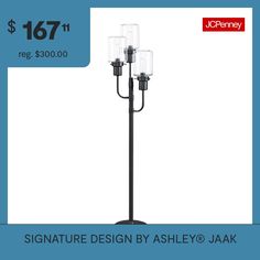 a light pole with three lights on it and the price is $ 697 00