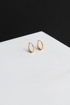 Tiny Egg Hoops Elegant Everyday Hinged Huggie Earrings, Everyday Elegant Hinged Huggie Earrings, Elegant Hinged Huggie Earrings For Everyday, Elegant Oval Hoop Earrings For Everyday, Timeless Oval Hoop Earrings With Polished Finish, Modern Oval Jewelry With Polished Edges, Formal Minimalist Oval Huggie Earrings, Elegant Everyday Hoop Earrings, Timeless Oval Everyday Earrings