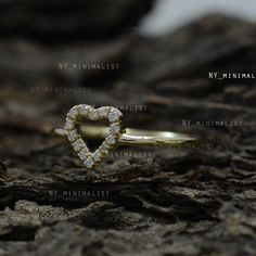 The ring made with Genuine SI clarity G-H color diamond and 14K solid yellow gold * SKU: SGR00788 * Made to Order. * Gold Purity: 14K Solid Yellow Gold (stamped) * Custom Gold Color: Yellow, Rose, White Gold * Custom Gold Purity: 9K/14K/18K (Charges Apply) * Diamond 100% Genuine Diamond * Diamond Weight: 0.09 ct. * Diamond Color: G-H * Diamond Clarity: SI1- SI2 * Diamond Cut: Brilliant Cut (Excellent) Product Measurements:- Ring Size: 2 to 10 (All sizes available) ✦ Size can be customized as per Minimalist Diamond Heart Ring For Anniversary, Minimalist Diamond Ring For Anniversary On Valentine's Day, Promise Stackable Heart Ring, Delicate Stackable Heart Ring For Wedding, Stackable Rings For Anniversary And Valentine's Day, Minimalist Heart Cut Diamond Ring For Anniversary, Dainty Halo Diamond Ring For Anniversary, 14k Gold Heart Promise Ring, 14k Gold Promise Heart Ring