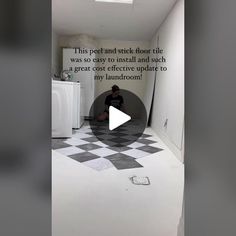 a man sitting on the floor in a bathroom