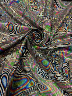 an image of a very colorful fabric with some interesting patterns on it's surface