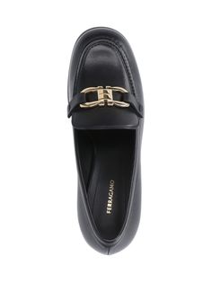 Ferragamo 'Gancini' black leather loafers with gold hardware, round toe, top 'Gancini' hardware, square leather heel, leather sole. Composition: 100% Calf Leather Black Leather Loafers, Ferragamo Shoes, Ferragamo Flats, Sneaker Wedge, Wedge Boots, Leather Loafers, Bridal Shoes, Manolo Blahnik, Lace Up Shoes